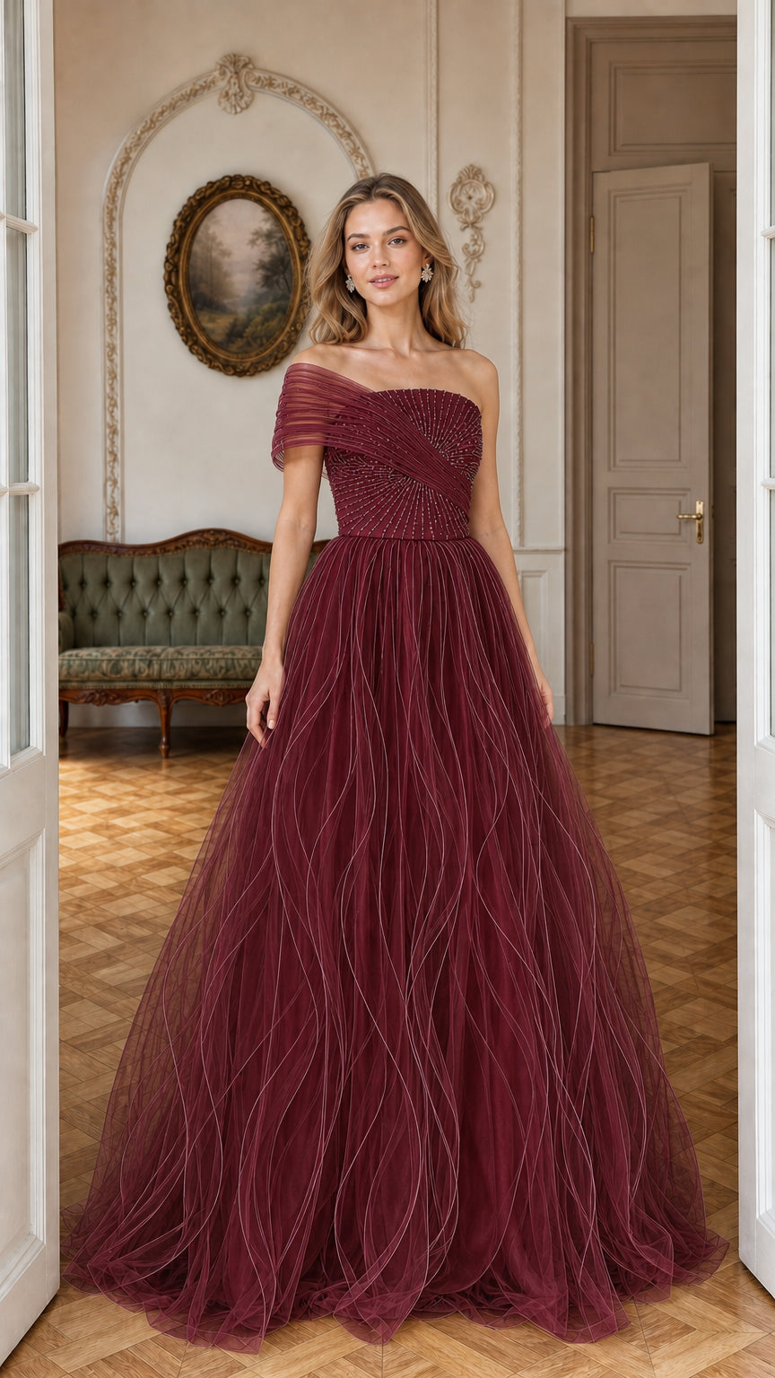 Front view of model wearing burgundy sequin bodice tulle ball gown