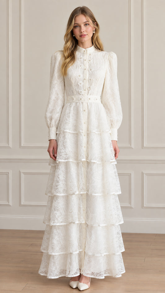 Full front view of model wearing white tiered lace high neck maxi dress with pearl accents