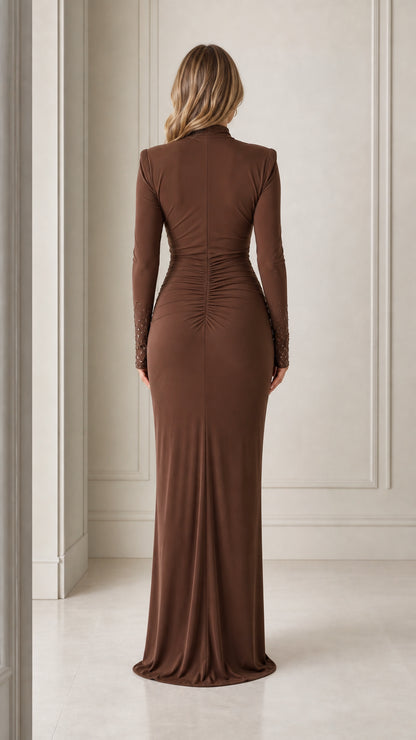Back view of model showcasing the sleek silhouette of the brown long-sleeve maxi dress