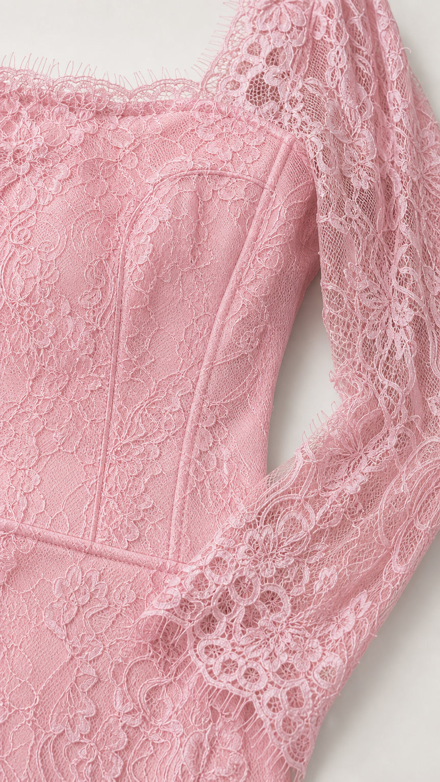 Close-up detail of blush pink floral lace bodice, square neckline, and sheer sleeves