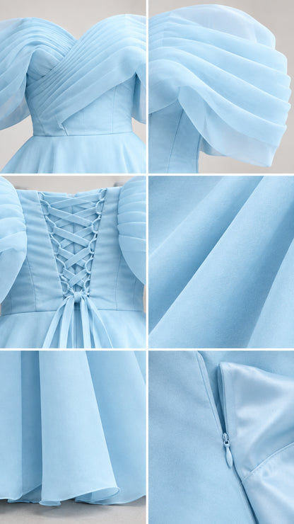 Close-up details of the pleated sweetheart bodice, ruffled sleeve, corset ties, and fabric
