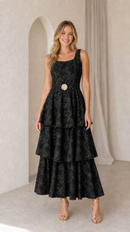 Black sleeveless floral embroidered tiered maxi dress with belt accent