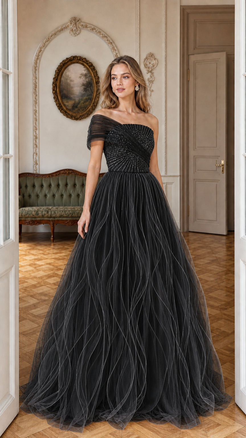 Front view of model wearing black sequined tulle formal ball gown