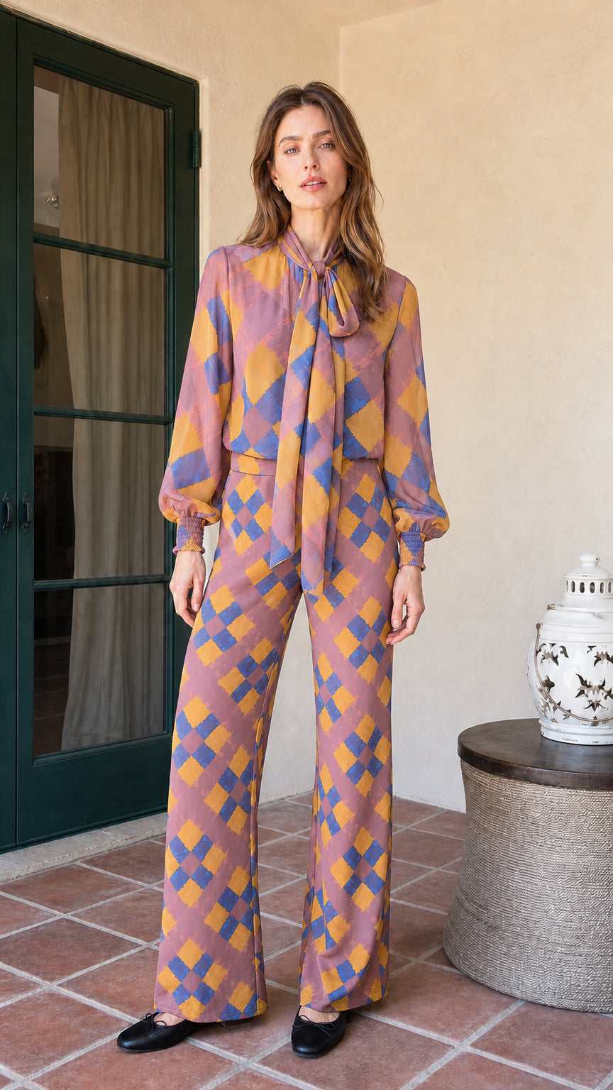 Model wearing mauve colorway of the plaid matching set
