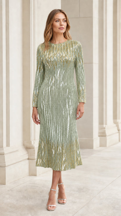 Front view of woman wearing sage green sequin chevron long sleeve midi dress
